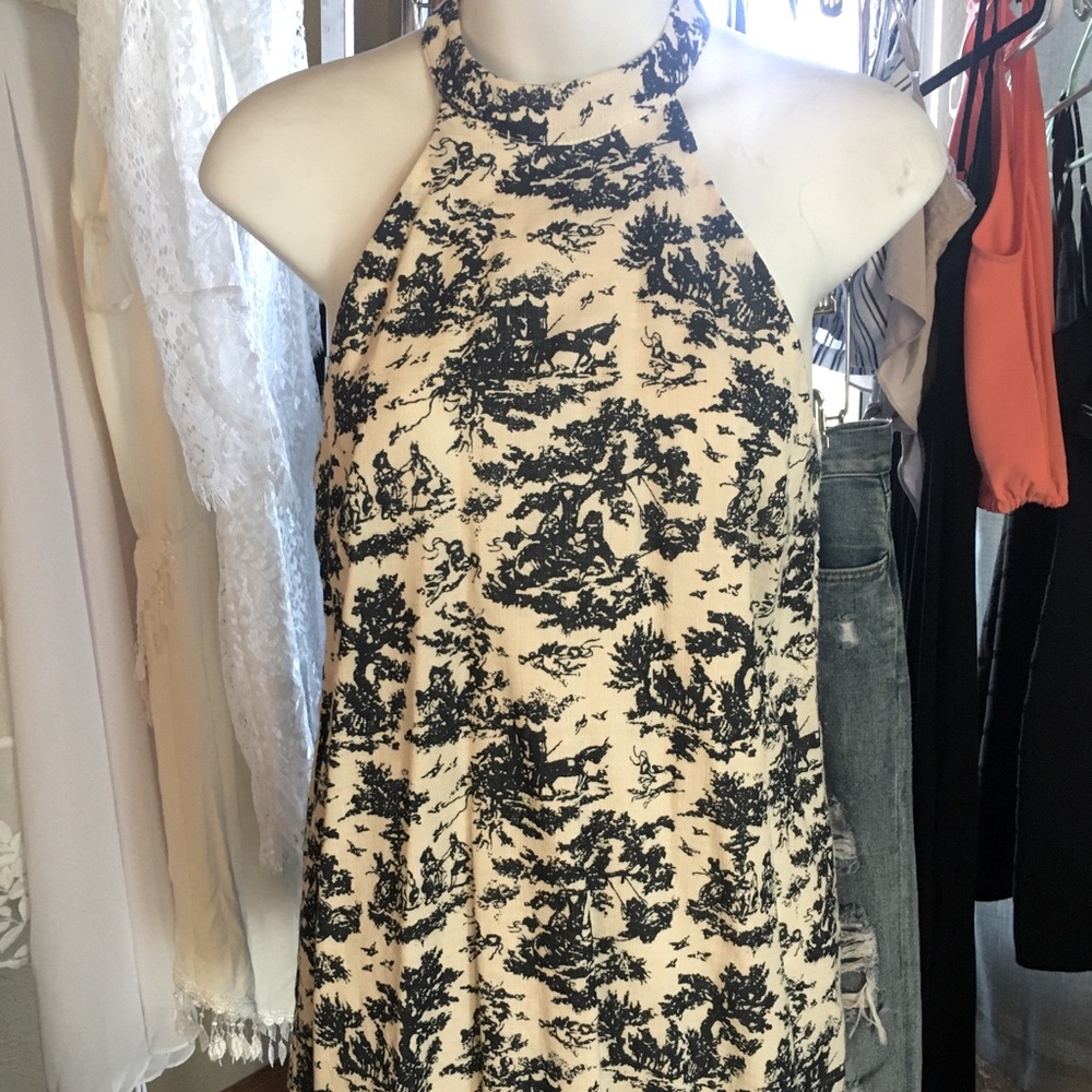 Doe and Rae small wrap around neck tank. Blue pattern white shirt .